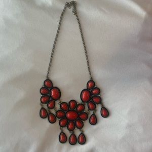Women’s necklace with burnt orange colors